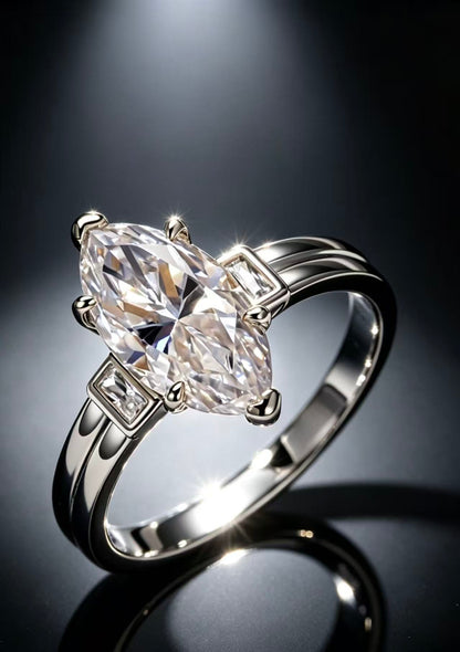 Silver 18K gold plated engagement ring with a 3.0ct D color marquise moissanite and two baguette side stones.
