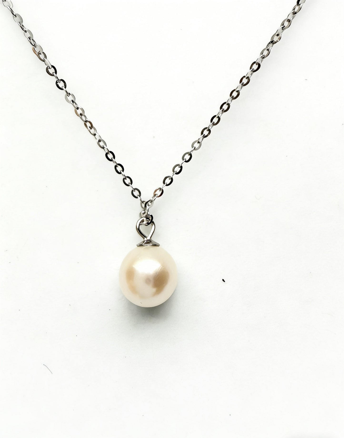 Luvymia 7mm Hepu saltwater pearl pendant necklace with a silver chain.