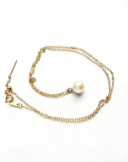7mm Hepu saltwater pearl pendant necklace with a gold-plated chain on a white background.