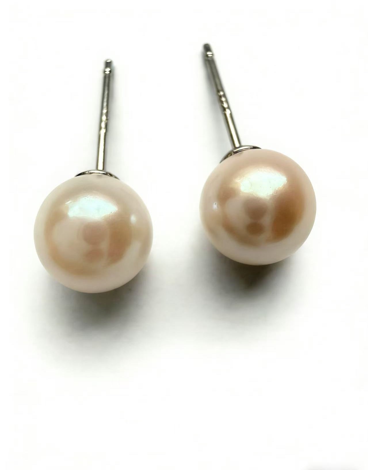 Pair of Luvymia 7mm natural South Sea pearl stud earrings with sterling silver posts.