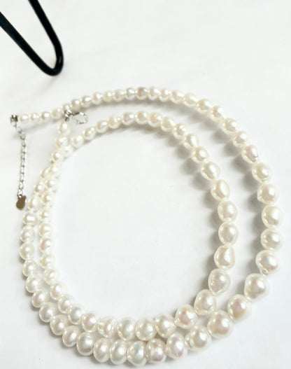 Luvymia baroque freshwater pearl necklace with 3-4mm soft white seed pearls and 925 sterling silver clasp.