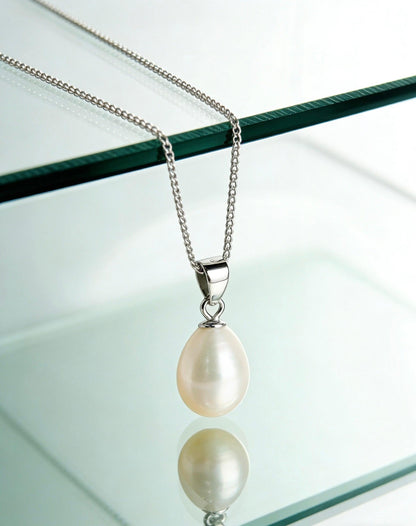 Baroque freshwater pearl pendant necklace with a cream-white pearl and 925 sterling silver chain.