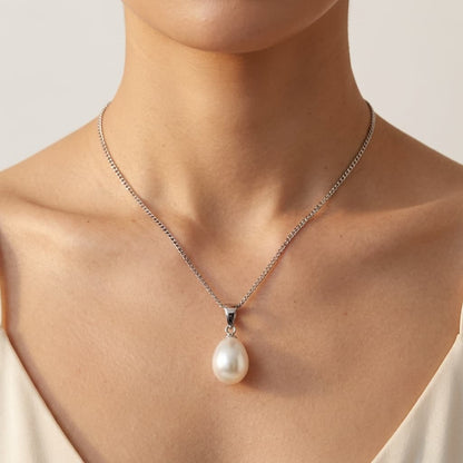 Woman wearing a Luvymia Baroque freshwater pearl pendant necklace with a 925 sterling silver chain.