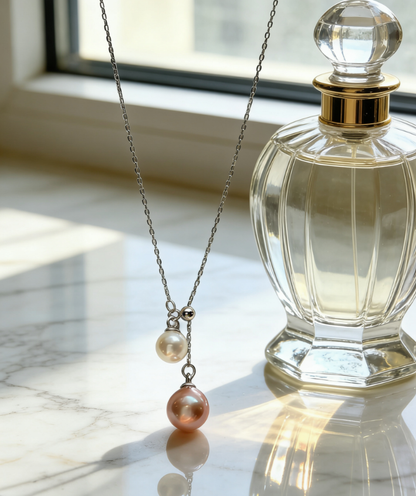 925 sterling silver necklace with a 6-7mm peach pink and 4-5mm white double freshwater pearl pendant.