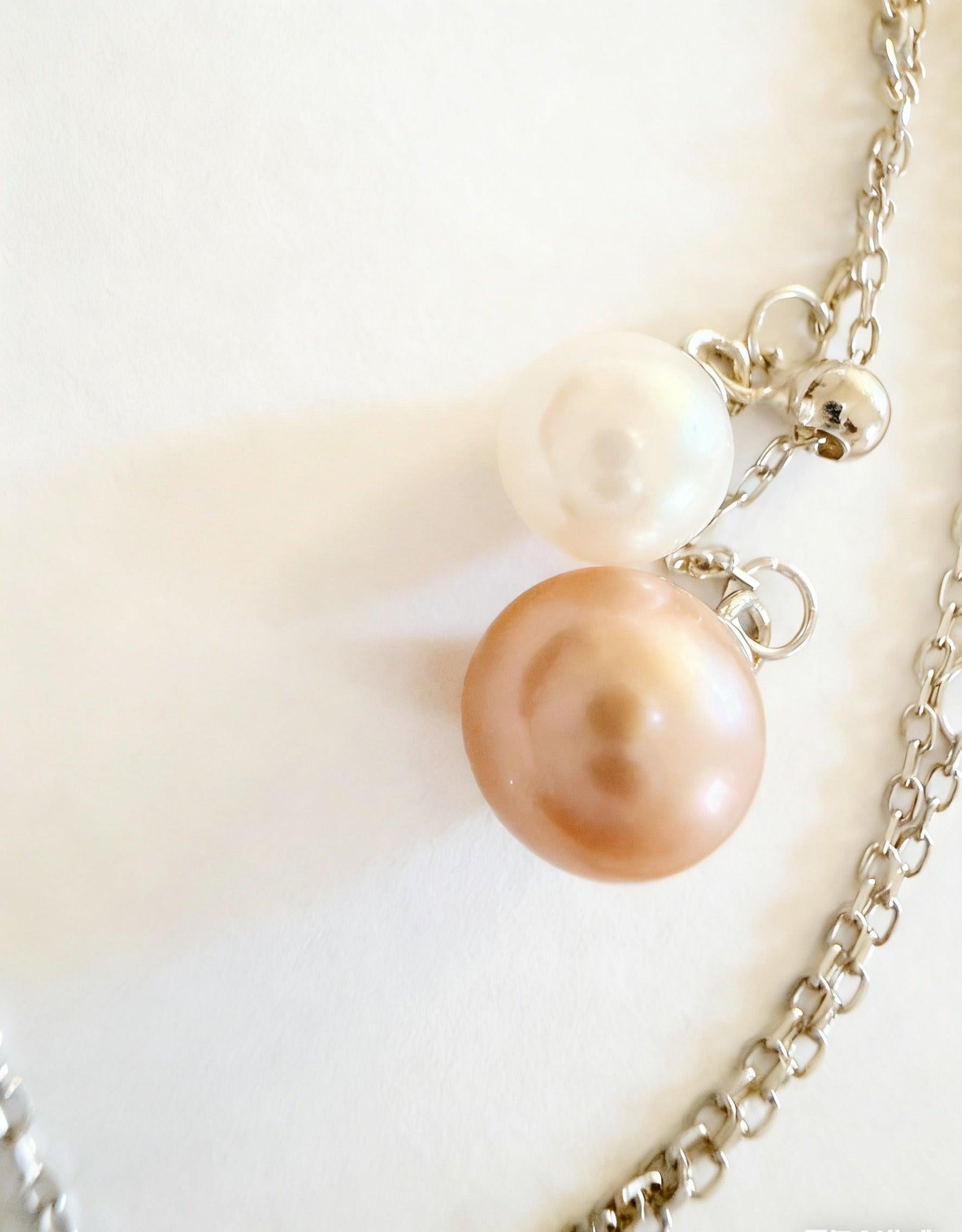 Luvymia double freshwater pearl pendant necklace with 6-7mm peach pink and 4-5mm white pearls on a silver chain.