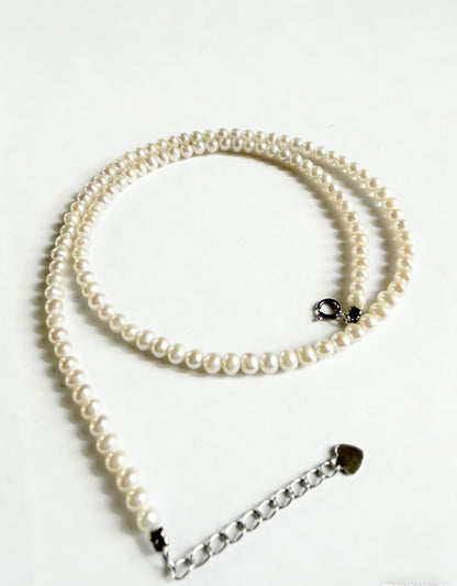Minimalist 3-4mm near-round freshwater pearl necklace with 925 sterling silver clasp and extender.