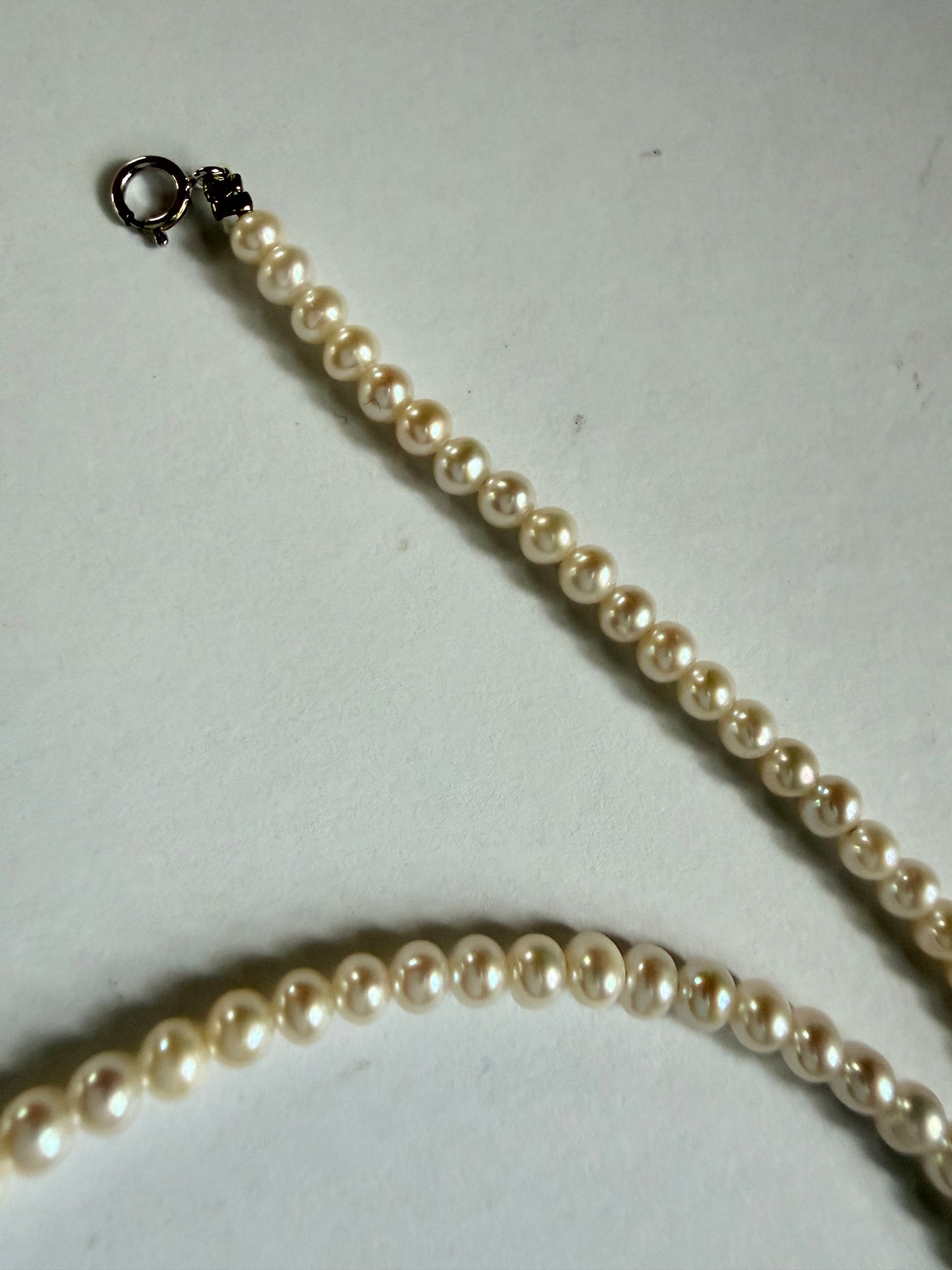 Minimalist Luvymia 3-4mm near-round freshwater pearl necklace with 925 sterling silver clasp.