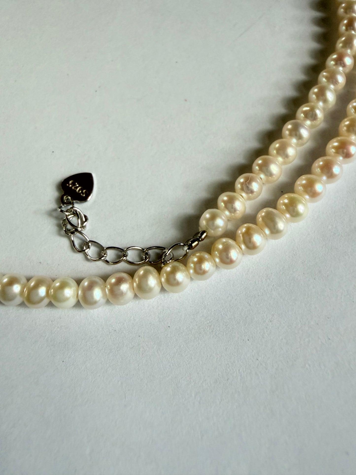 Minimalist 3-4mm round freshwater pearl necklace with 925 sterling silver heart clasp and extender chain.