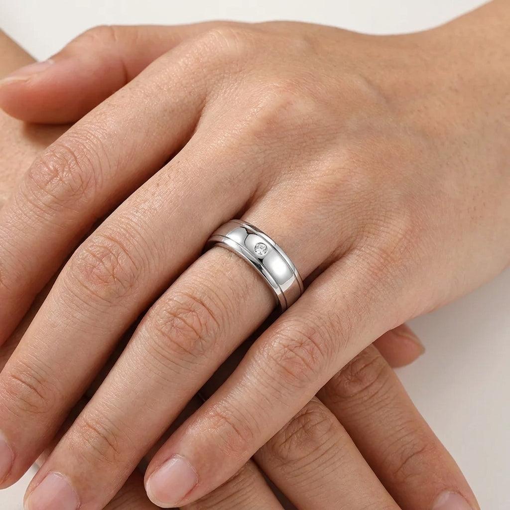 Men's S925 silver wedding ring with a 0.4ct round moissanite center stone and double pavé rails.