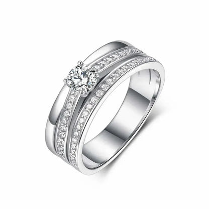 Men's S925 silver wedding ring with 0.4ct moissanite center stone and double pavé rails.