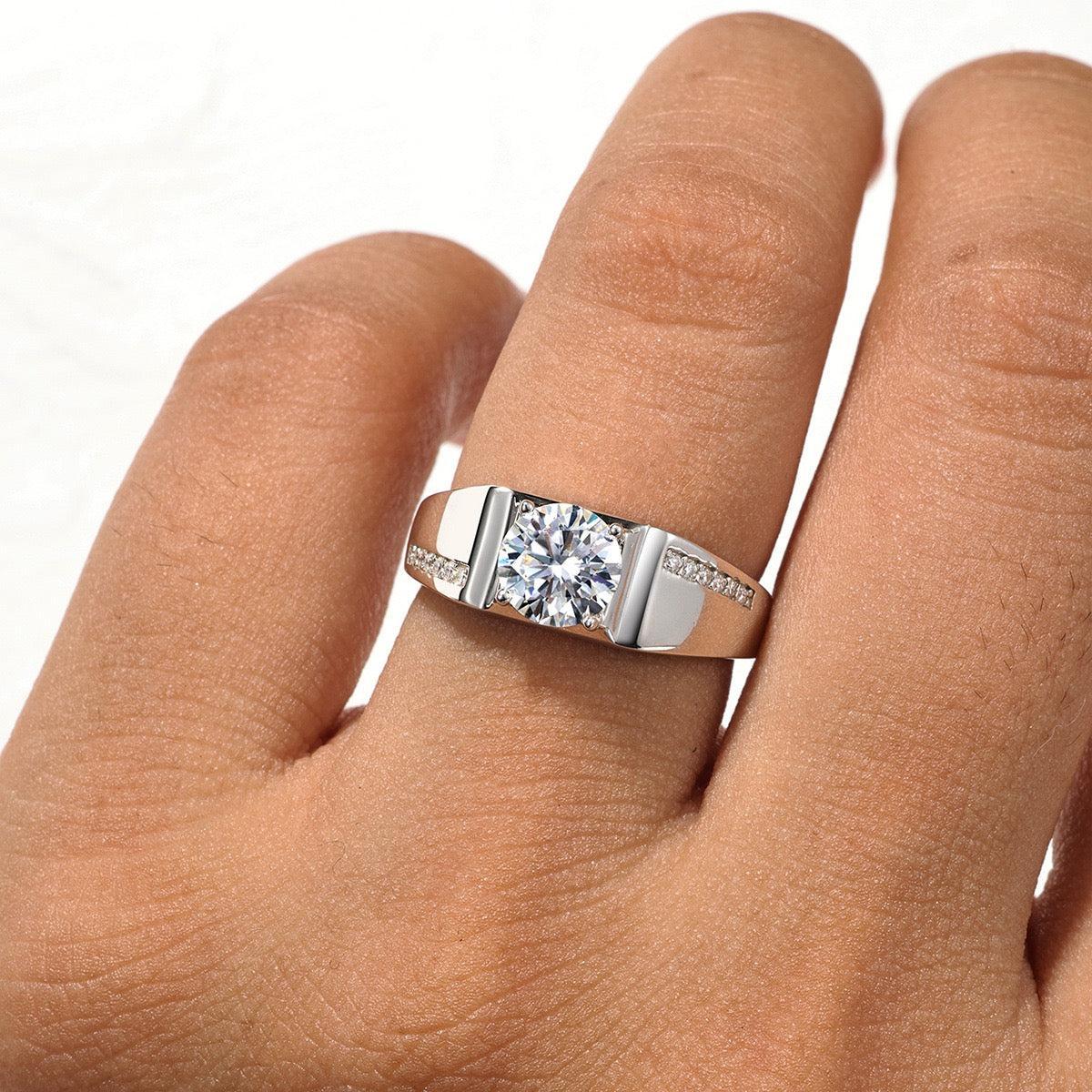 Men's S925 silver wedding ring with a 1ct round brilliant moissanite and pavé accent stones.