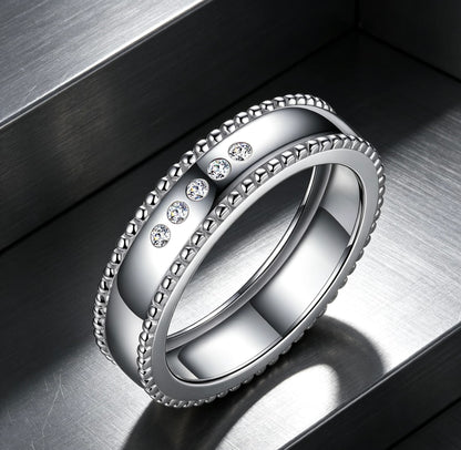 Men's S925 silver wide band wedding ring with beaded edges and five D-color moissanite stones.