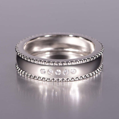 Men's wide S925 silver wedding ring with beaded edges and five D-color moissanite stones.