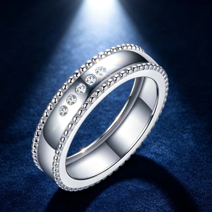 Men's wide S925 silver moissanite wedding ring with beaded edges and five D-color VVS1 stones.