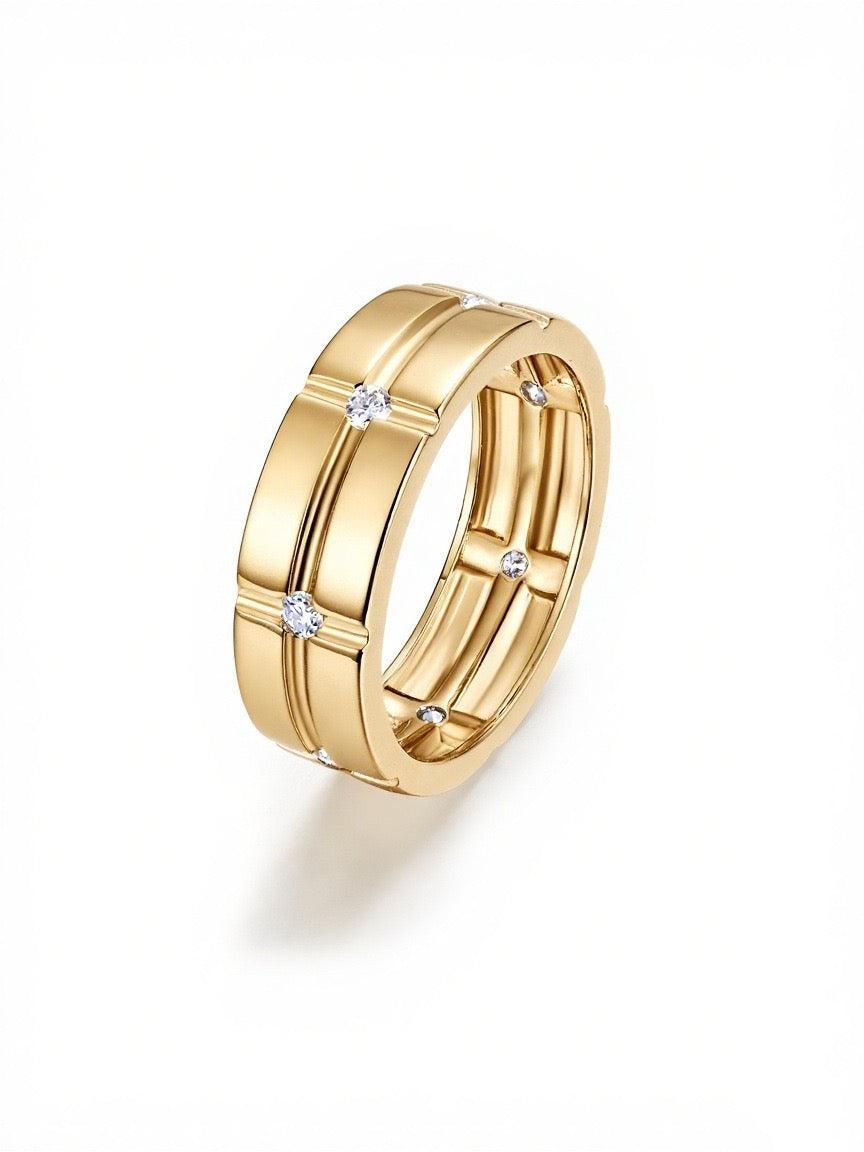 Men's gold wide band ring with a grid pattern and seven flush-set D-color moissanite stones.