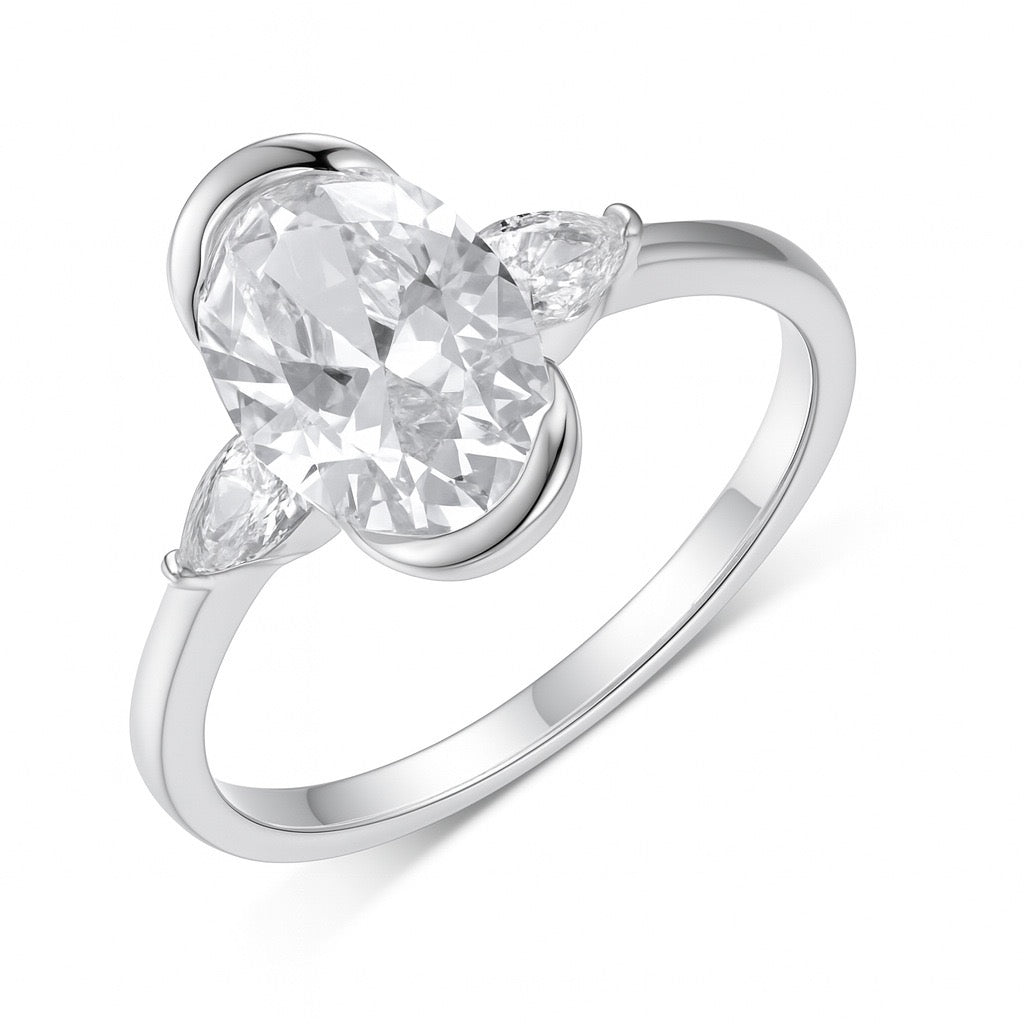Oval Three-Stone Moissanite Ring — D Color VVS1 · Pear Side Stones · S925 Silver | LUMINA VOW