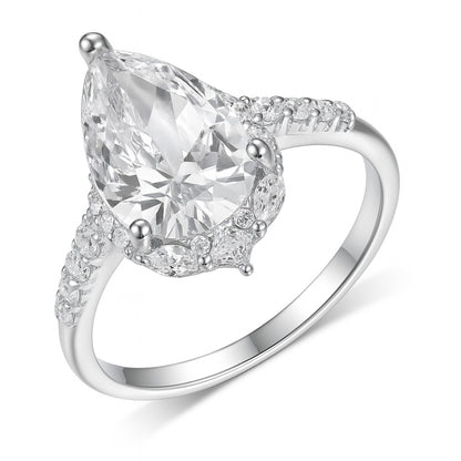 8x12mm pear-cut D color moissanite halo ring with marquise and pavé accents on S925 silver.